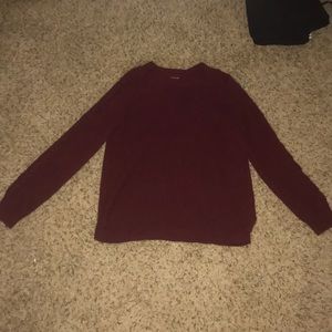 Knitted sweater with detailed sleeves